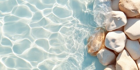 Poster - Eco-Elegant Ocean Display Sunlit Water and Textured Stones with Plastic Debris - Marine Conservation Visuals and Environmental Impact Awareness