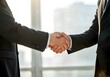 © anees - businessman handshake for teamwork of business merger and acquisition, partnership