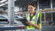 © Gorodenkoff - Caucasian Female Manager Walking In Warehouse With Automated Conveyor Belt, Using Tablet. Professional Woman Working With Orders Of Online Marketplace Customers In Distribution Center.