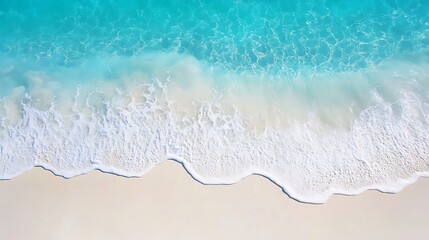  Crystal turquoise ocean waves washing over a white sandy beach