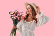© HBS - Young beautiful smiling charming girl in a straw hat and modern dress holding a bouquet of spring flowers. Romantic gentle spring mood.International Women's Day.