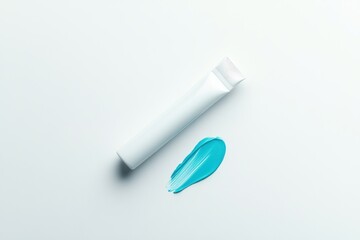 Poster - Creamy turquoise paint squeezed from a tube onto a white surface for artistic creativity