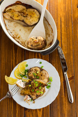 Wall Mural - Fish with herbs and lemon on a plate