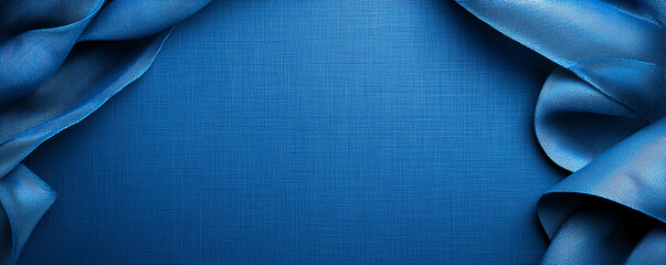 Poster - Elegant blue fabric texture with soft draping edges, perfect for backgrounds or design projects. rich color adds touch of sophistication and depth