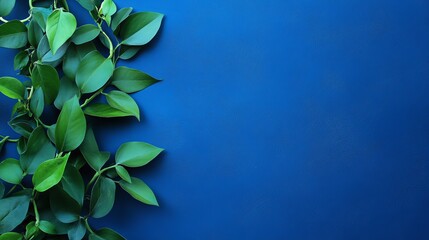 Poster - Vibrant Green Leaves Contrasting With a Deep Blue Background Offering a Calming Aesthetic to Interior Decor and Design Trends