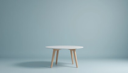 Poster - Modern Round Table with Wooden Legs on Soft Blue Background