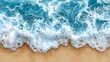 © wannathon - Aerial View of Turquoise Ocean Waves Crashing on Golden Sand Beach on a Sunny Day