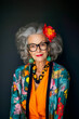 © Erik González - A woman with a flower in her hair and glasses