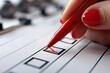 © Yuliia - Woman Holding Red Pen Filling Out Checklist Form in Close-up View