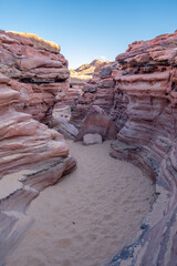 Poster - Exploring Tsvetnoy Canyon in Egypt reveals breathtaking rock formations and tranquil sandy paths