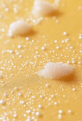 Poster - Close-Up View of Tiny Bubbles on Glossy Yellow Surface Creating a Textured Abstract Background for Modern Design and Artistic Concepts