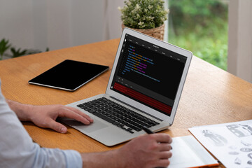 Fototapete - software development programming on computer screen for brisk application and program coding