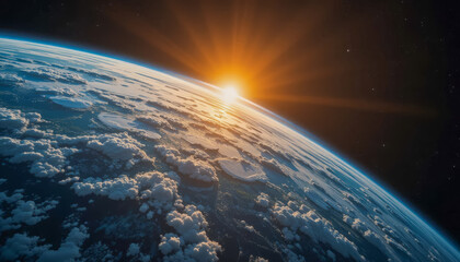 Wall Mural - Sunrise with glowing sunlight over Earth's horizon, illuminating clouds and atmosphere from space