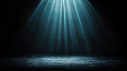 Poster - soft blue light rays illuminating dark studio space creating dramatic atmosphere for artistic photog