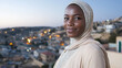© Ari - African muslim woman wearing traditional abaya smiling enjoying traveling at gulf city