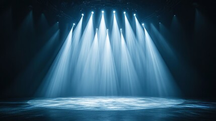 Poster - Bright stage spotlights illuminate a dark empty stage floor.