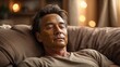© fotofabrika - Man with painted face resting on couch in cozy living room during evening light glow