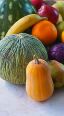 Canvas Print - Pumpkins, melons, watermelons, and various autumn fruits on the table.