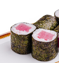 Wall Mural - Fresh sushi rolls with tuna in a minimalist setting