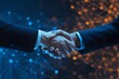 © ARSHDEEP - Two business professionals shake hands, symbolizing partnership and collaboration in a digital world.