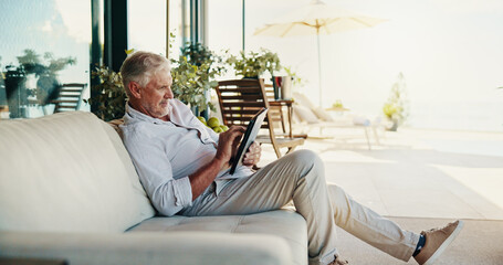 Poster - Outdoor, relax and senior man with tablet, typing and internet with email notifications. Mature person, comfort or guy on sofa, break and house with connection, digital app or communication with tech