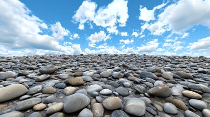 Wall Mural - Expansive View of Smooth Pebbles Underneath a Bright Blue Sky with Fluffy White Clouds on a Sunny Day