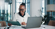 © PeakPoints/peopleimages.com - Stats, smile and woman with tablet, office or happy for traffic on website, laptop or SEO manager. Project, digital marketing and black person with app for keyword research or social media for trends