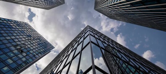 Poster - Dynamic perspectives of urban skyscrapers against a cloudy sky at dusk