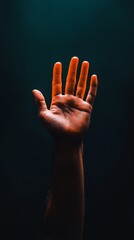 Poster - A solitary hand stretches towards an unseen source of light, symbolizing a yearning for connection and understanding. The dark background enhances the emotional depth, evoking introspection