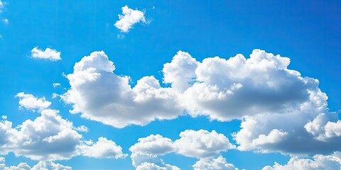 Aufkleber - Fluffy white clouds scattered throughout a vibrant blue sky with a bright daylight ambiance creating a serene and peaceful atmosphere.
