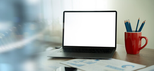 Poster - Laptop with blank screen on table. Workspace background new project on laptop computer with blank copy space screen for your advertising text message