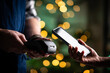 © Ievgen Skrypko - Wireless Payment Process With Smartphone To Waiter