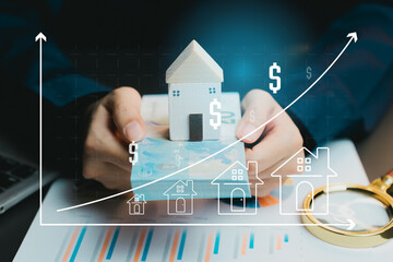 Poster - Hands Holding Wooden House Model With Money and Growth Graph