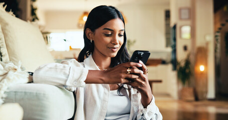 Aufkleber - Woman, mobile and smile in home with social media, reading blog and interaction in online dating profile. Girl, happy or phone in living room for comfort, streaming video and typing for text message