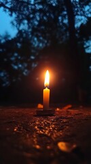 Poster - A single candle radiates warmth with its flickering flame, illuminating the surrounding darkness. The stillness of the night creates a serene atmosphere, inviting reflection
