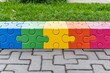 © Thanyarat - Colorful puzzle pieces symbolize global awareness and acceptance of autism spectrum disorder worldwide