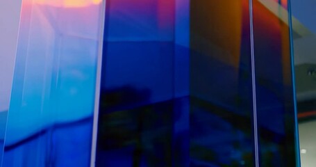 Poster - Abstract Glass Panel Structure with Blue and Orange Color Reflective Surface
