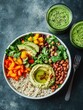 © vefimov - A delicious and healthy quinoa salad with an assortment of fresh vegetables, beans, avocado, and a side of refreshing smoothie. A great lunch or dinner option for a balanced diet.