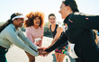 © Jacob Lund - Group of diverse female runners bonding before a race