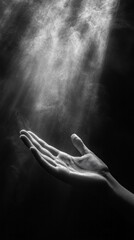 Poster - A hand reaches upwards, receiving a beam of light that pierces through the darkness, creating a moment of tranquility and reflection in a quiet space, evoking spiritual wonder