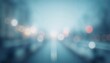 © Elena - Blurred city street with bright bokeh lights in cool colors creating a dreamlike atmosphere