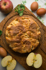 Wall Mural - Delicious cinnamon cake with fresh apple pieces. Traditional German recipe.