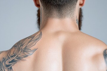 Poster - close-up of intricate tattoo art on skin with plain background
