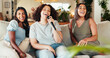 © HockleyM4/peopleimages.com - Karaoke, friends and women singing on living room sofa with microphone for music, playlist or radio. Reunion, party and people with energy, song and having fun together for bonding in home lounge