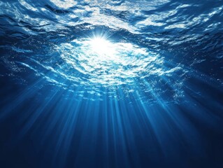 Poster - Underwater Sunlight Beams Through Ocean Surface Creating Serene Blue Water Background with Rays of Light Illuminating the Depths