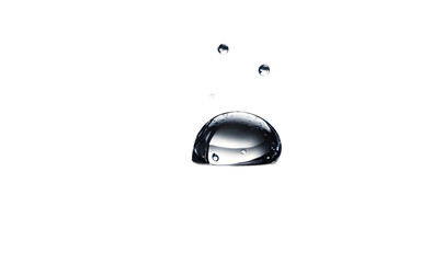 Poster - A single raindrop splashing on a surface, isolated on a empty plain background