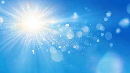 bright sun rays in clear blue sky with light bokeh effects and lens flares. natural summer day backg