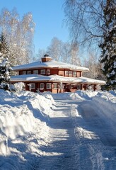 Canvas Print - Snowy Winter Day at a Red Wooden House