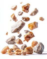 Poster - Dynamic composition of falling stones in various shades of brown and gray against a bright white background creating a sense of movement and geological wonder