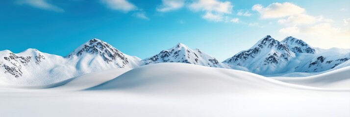 Naklejka na meble Majestic Snow Covered Mountains Under Bright Blue Sky with Soft Clouds